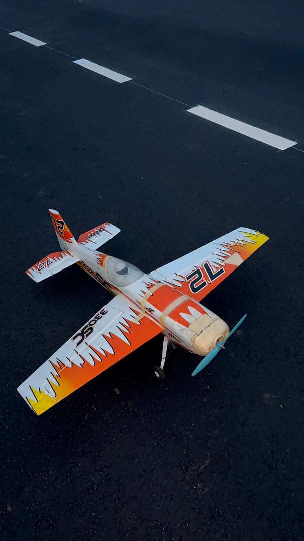 RC aircraft staged on the tarmac