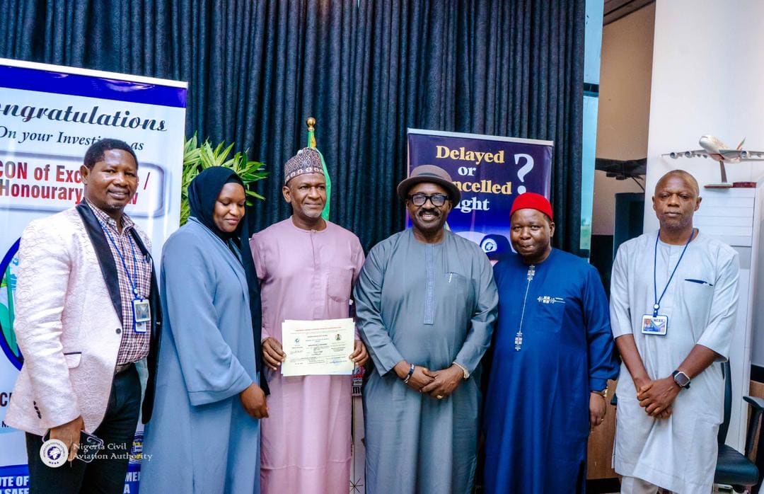 Mekatron representatives with officials at a Nigeria Civil Aviation Authority certificate presentation