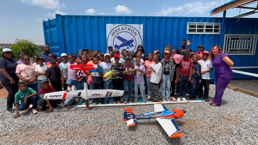 School children visiting Mekatron with RC aircraft